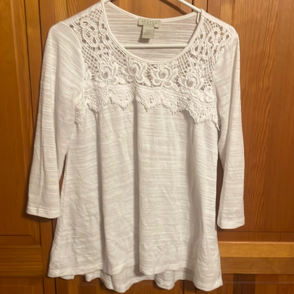 Three women’s lace detail shirts, size small.